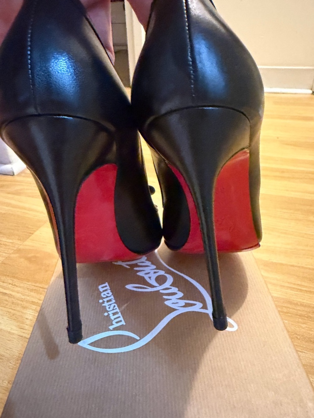 Christian Louboutin Black Leather Peep-Toe Pump with Bow and Red Heel